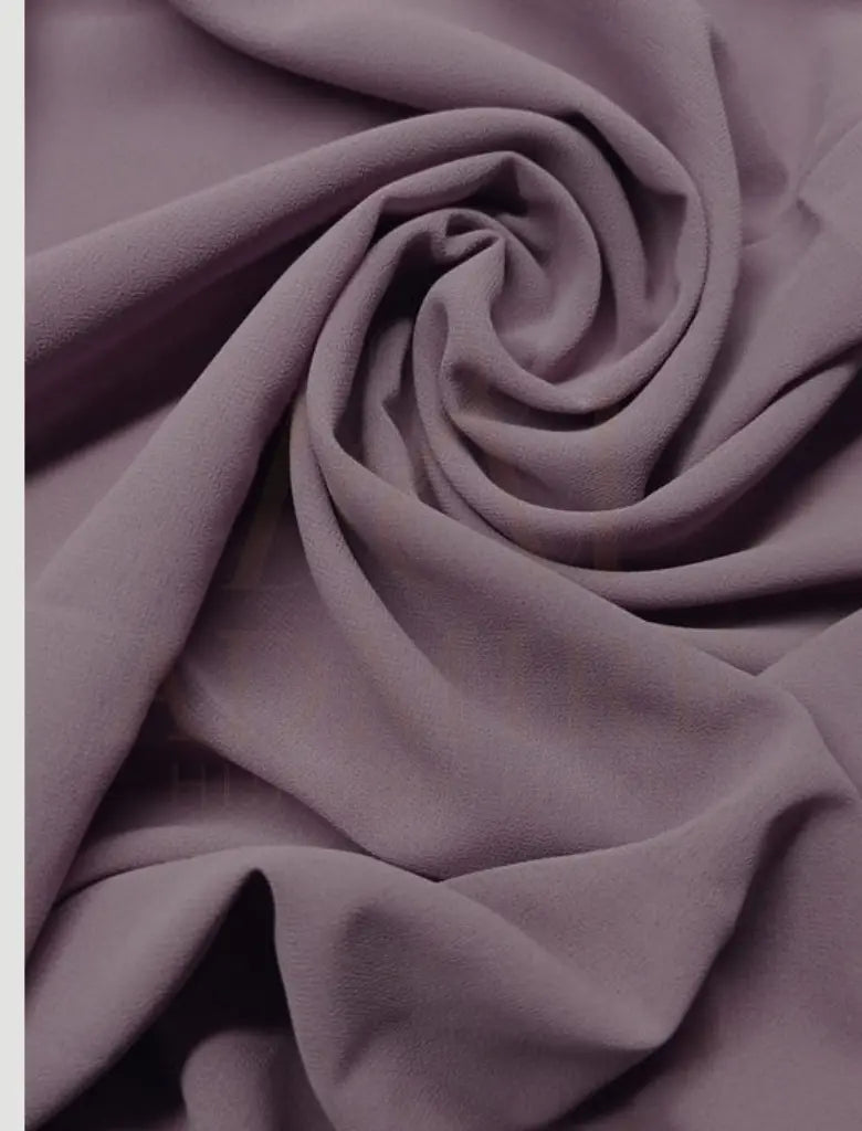 the Chiffon Georgette scarf, expertly crafted to blend versatility with refined elegance.