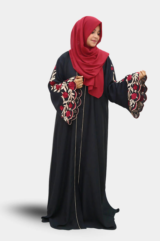Girl in a modest abaya dress paired with a classic hijab for a timeless look.