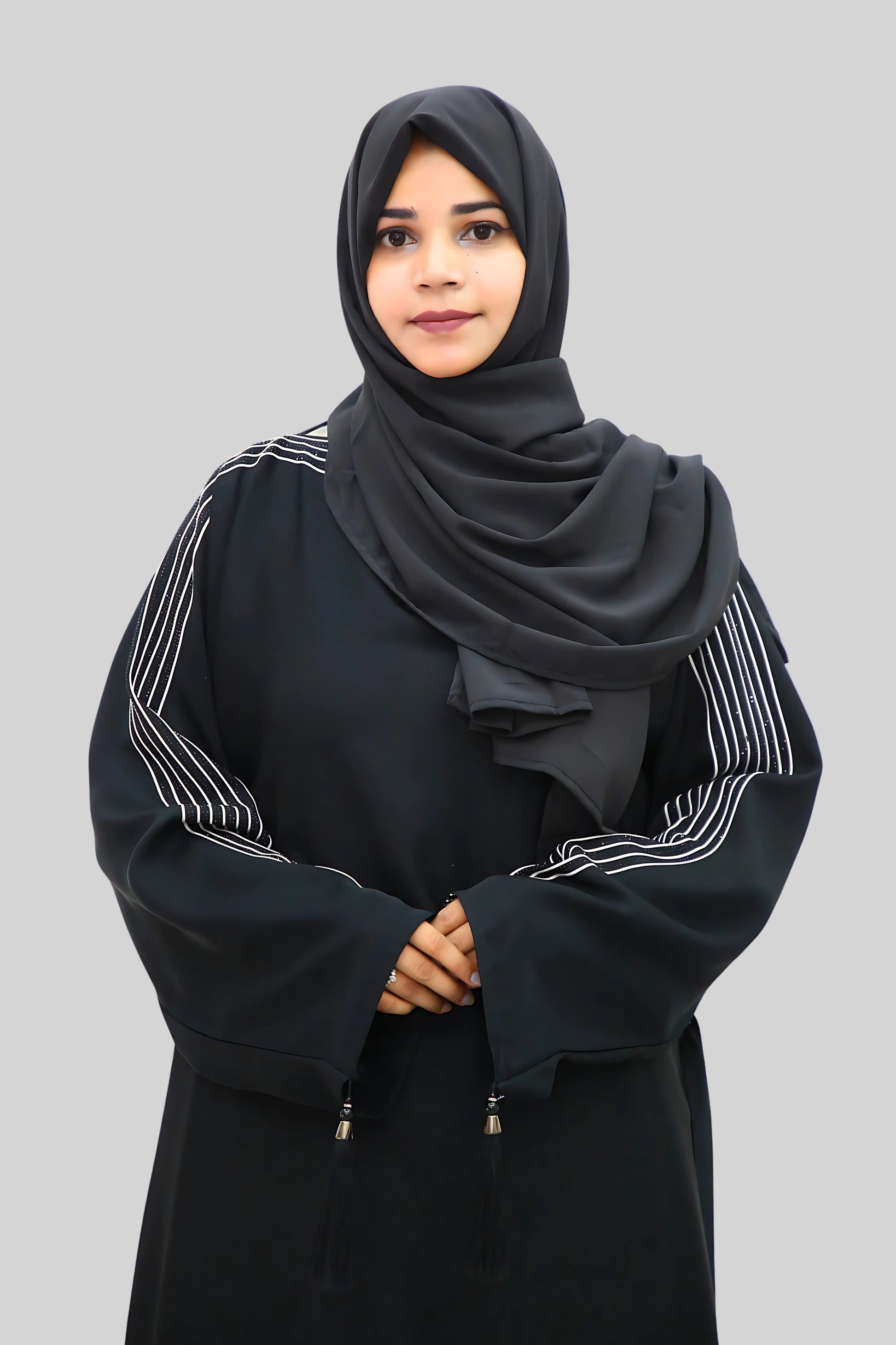 Chic modest outfit featuring a flowy abaya and soft fabric hijab for everyday wear.