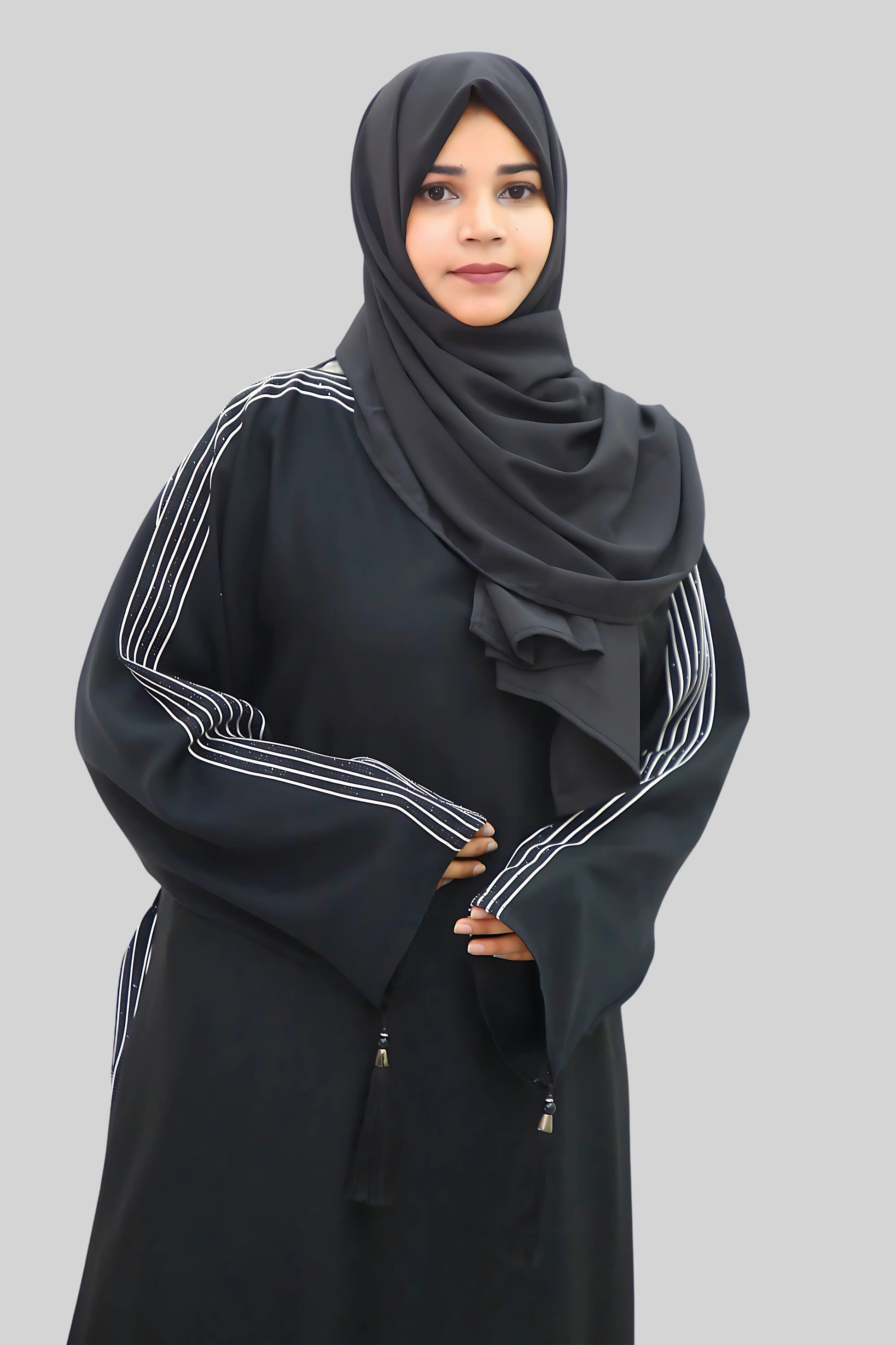 Chic modest outfit featuring a flowy abaya and soft fabric hijab for everyday wear.