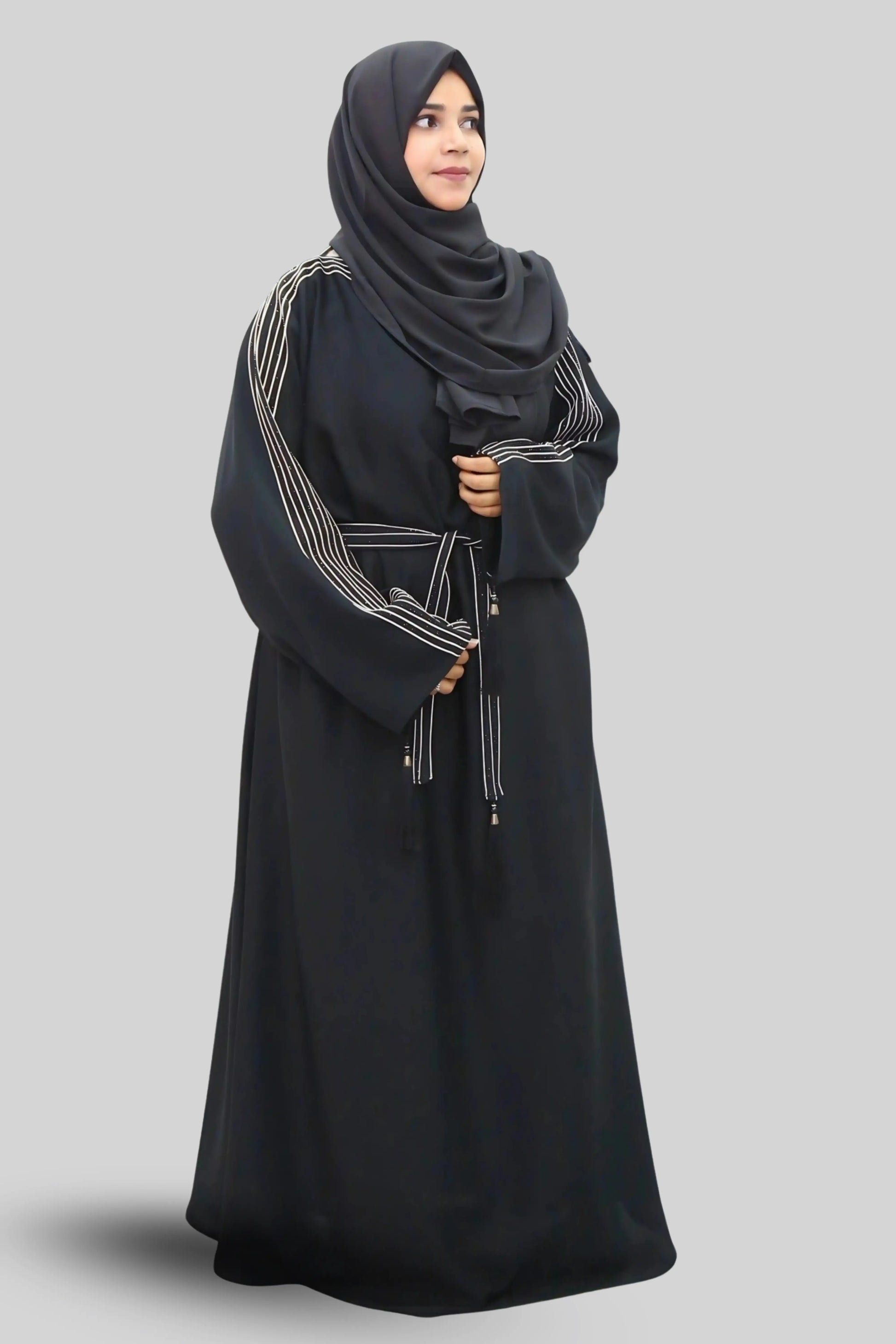 Chic modest outfit featuring a flowy abaya and soft fabric hijab for everyday wear.