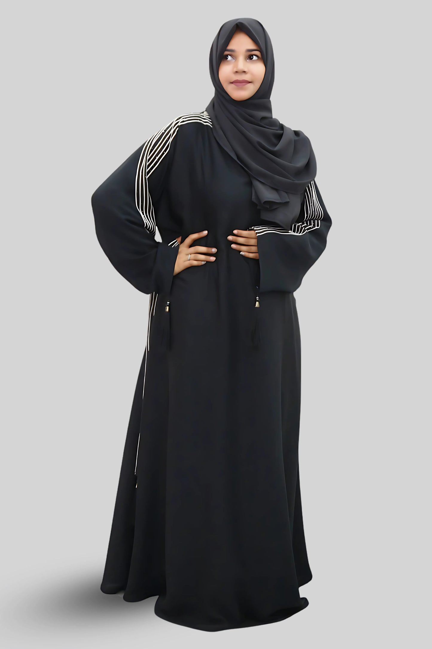 Chic modest outfit featuring a flowy abaya and soft fabric hijab for everyday wear.