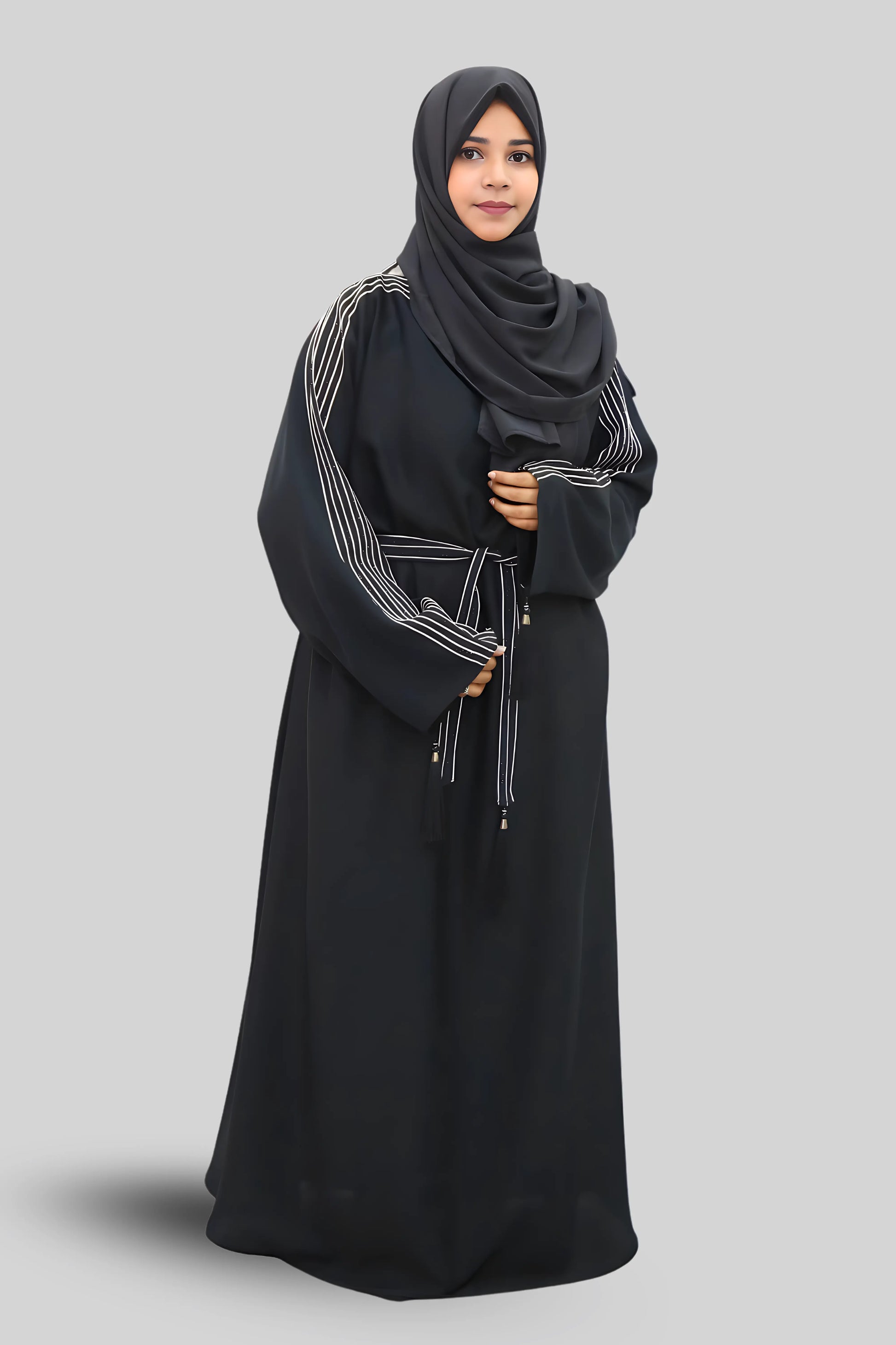 Chic modest outfit featuring a flowy abaya and soft fabric hijab for everyday wear.