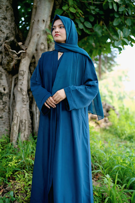 Premium fabric abaya with a matching hijab worn by a modest fashion model.