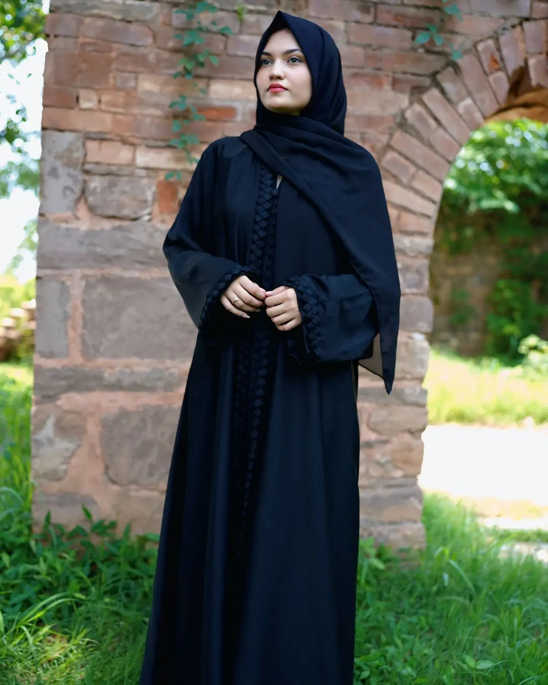 Girl is wearing premium quality abaya with matching hijab