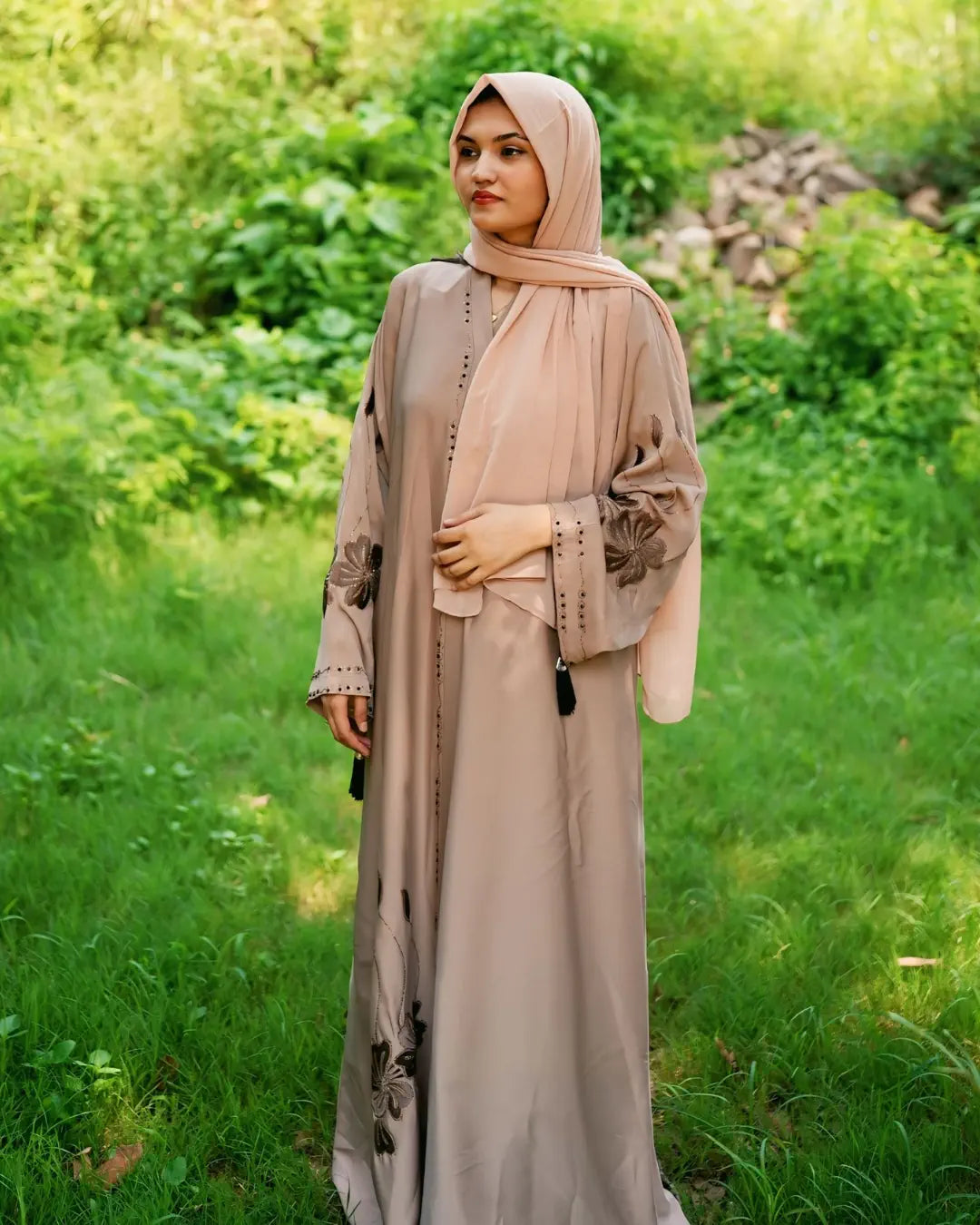 Girl is wearing premium quality abaya with matching hijab