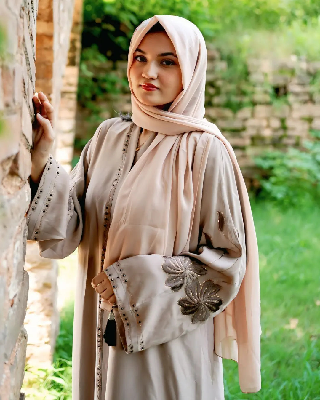 Girl is wearing premium quality abaya with matching hijab