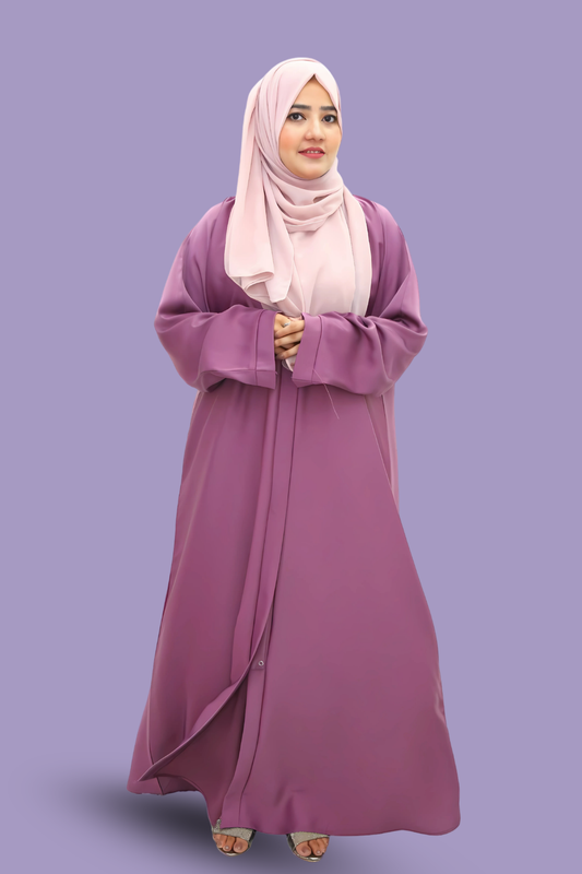 A girl wearing a premium quality abaya with hijab