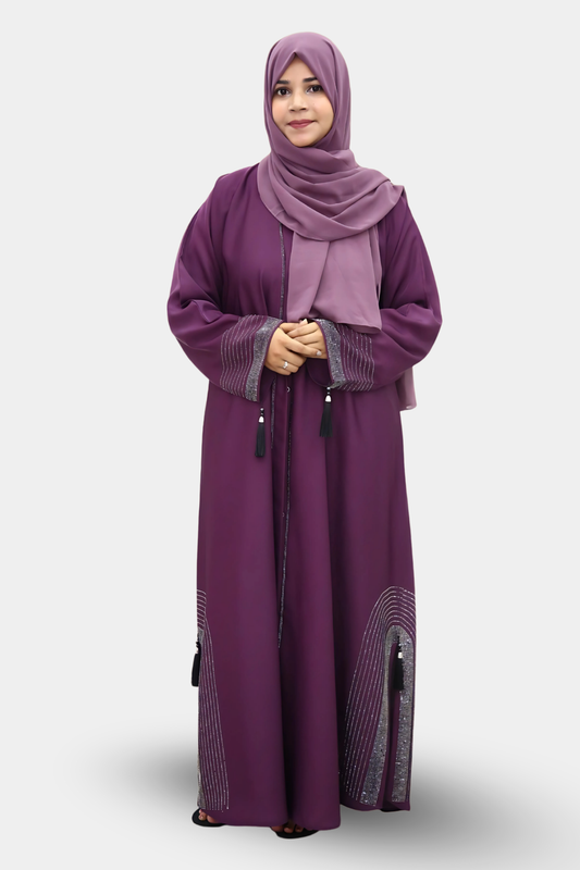 A girl standing in a studio wear premium quality abaya with contrast hijab