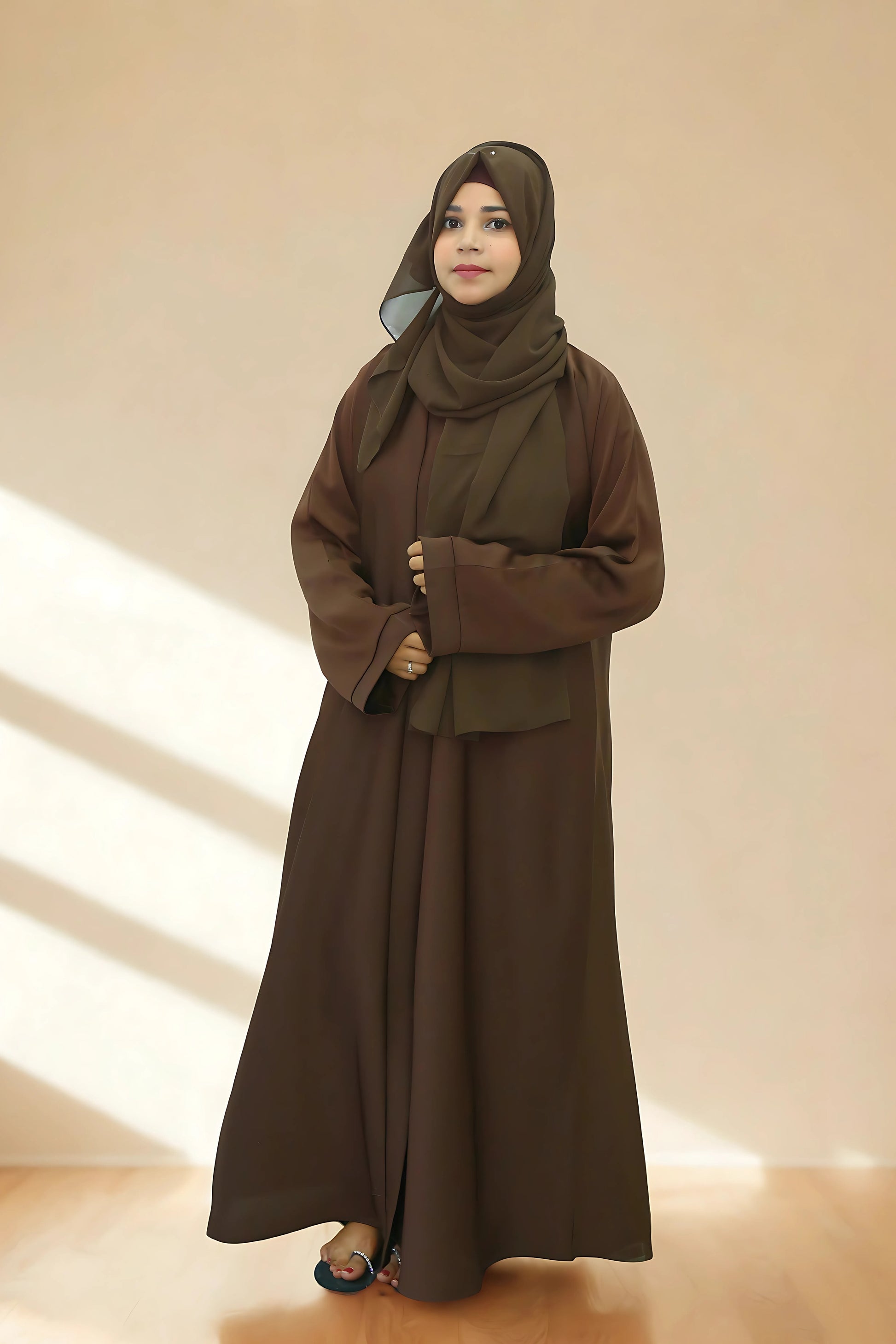 A Girl wearing an abaya and hijab