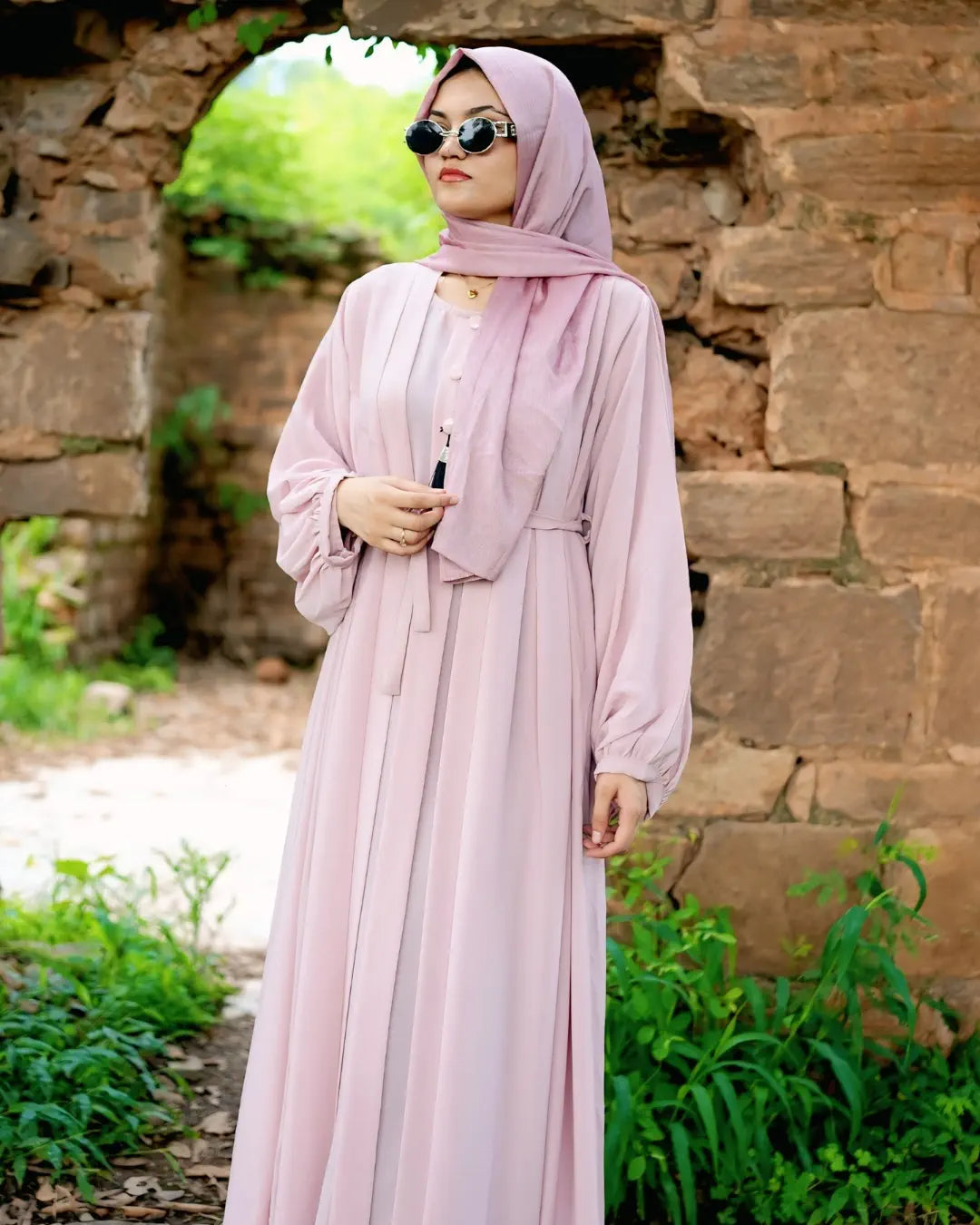 Girl is wearing premium quality abaya with matching hijab