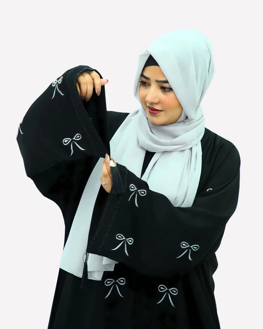 Girl is wearing premium quality abaya with matching hijab
