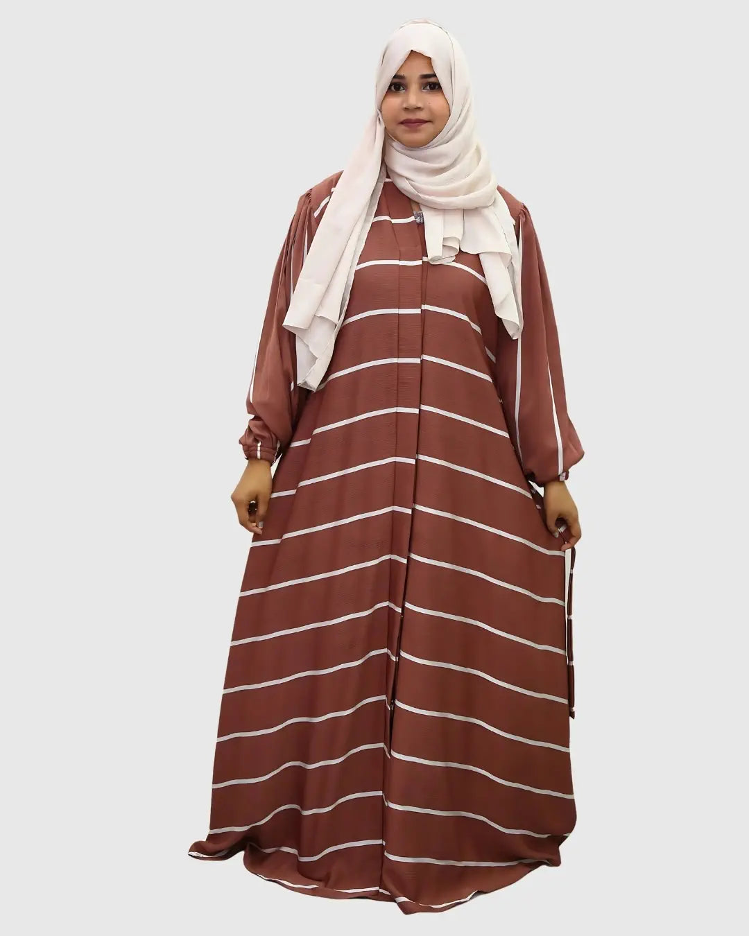 Girl is wearing premium quality zoom fabric abaya with hijab