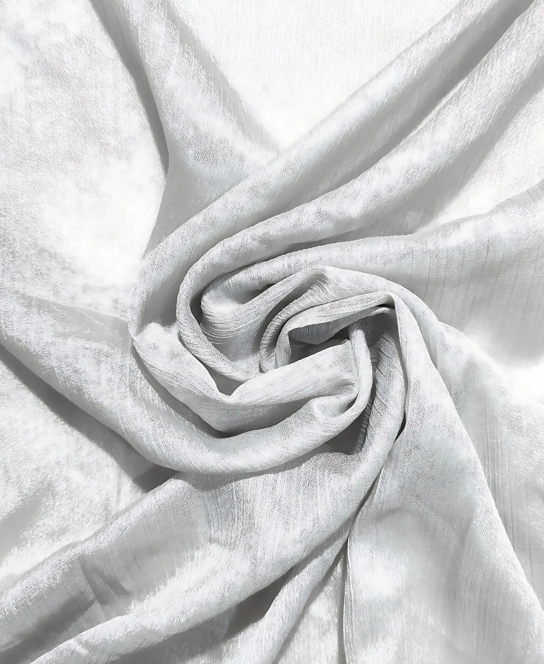 The Silk Crinkle Hijab is a refined essential that blends luxury, comfort, and versatility.