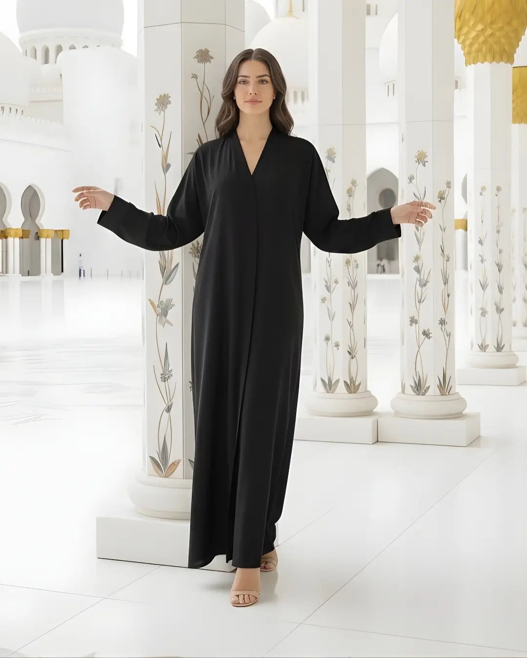 Woman in a long, light purple ABAYA standing in a mosque with white columns and gold accents.