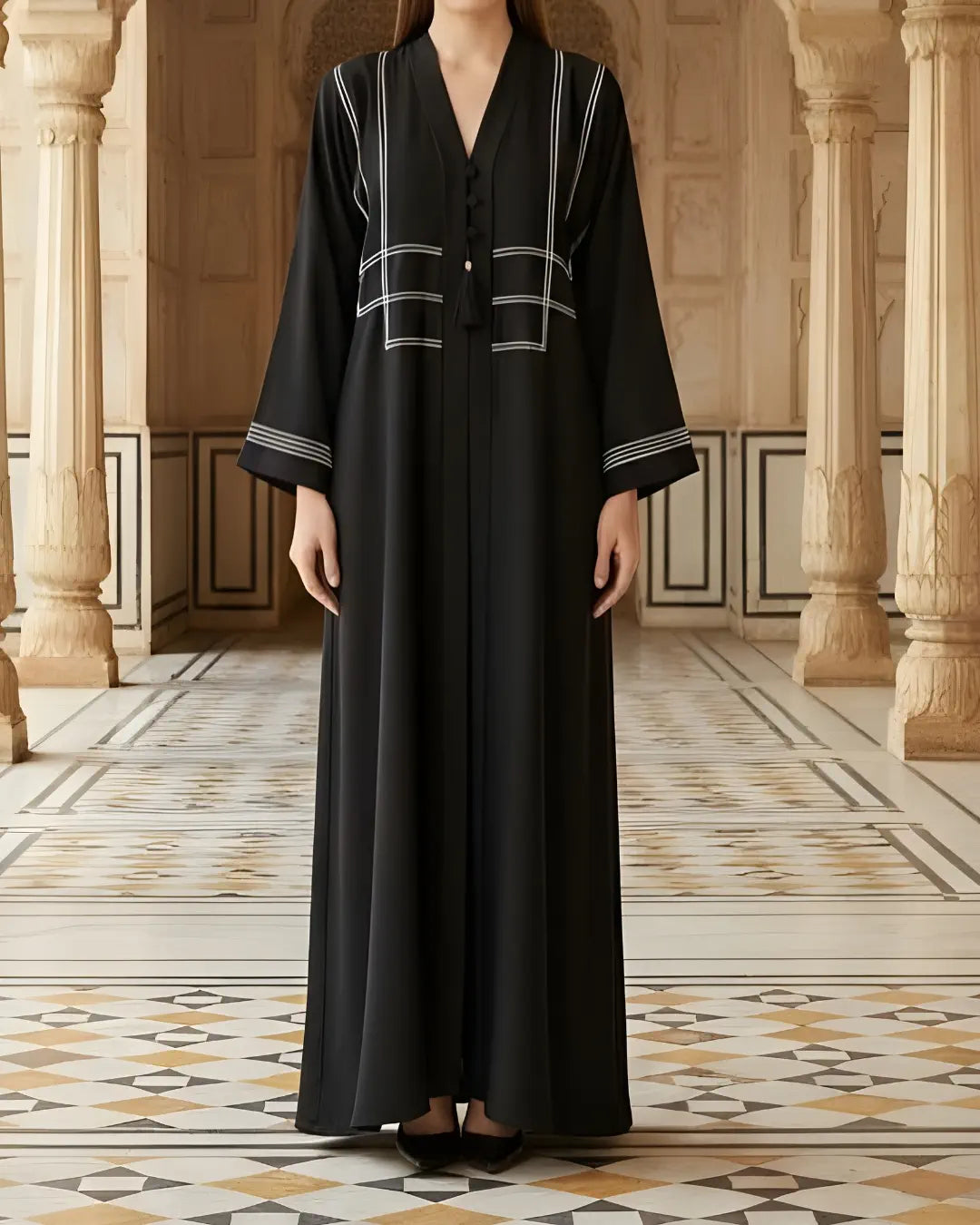 purple abaya with white embroidery in a decorative interior setting