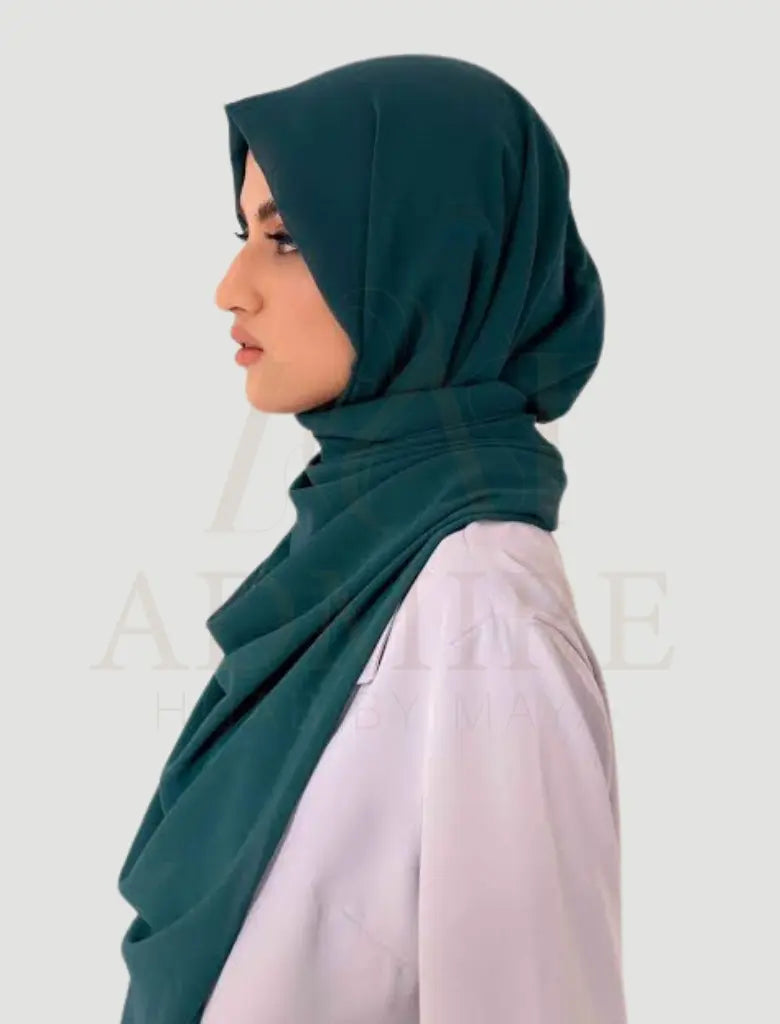  the Zinc Green Chiffon Georgette scarf, expertly crafted to blend versatility with refined elegance. 