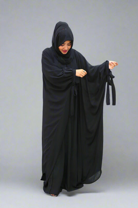 Elegant abaya and hijab outfit suitable for formal and casual occasions.